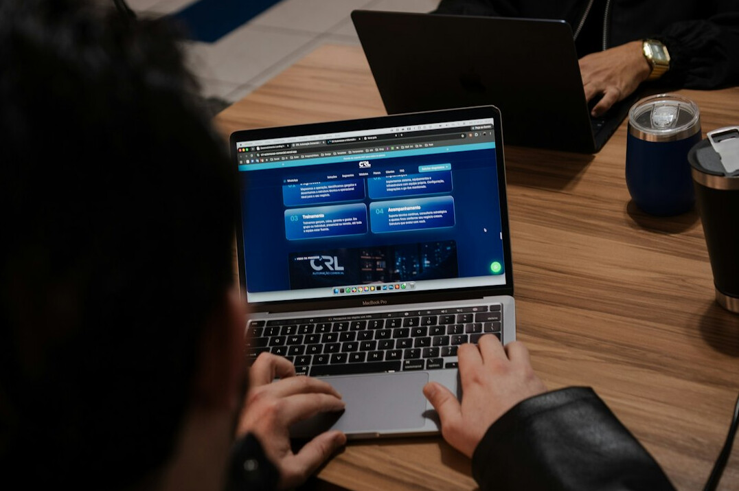 student learning programming on laptop